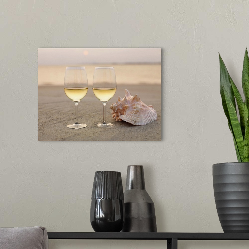 A modern room featuring Champagne glasses and shell on beach
