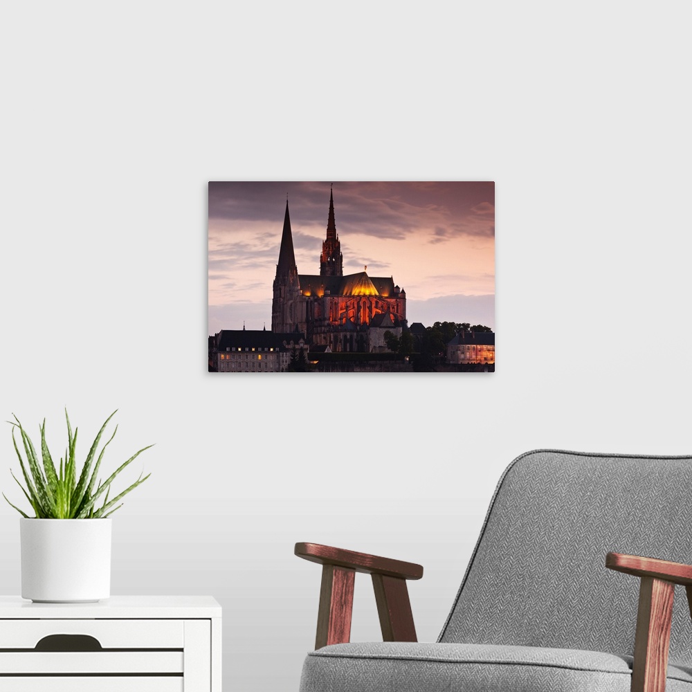 A modern room featuring France, Centre Region, Eure et Loir Department, Chartres, Chartres Cathedral, elevated view, dusk