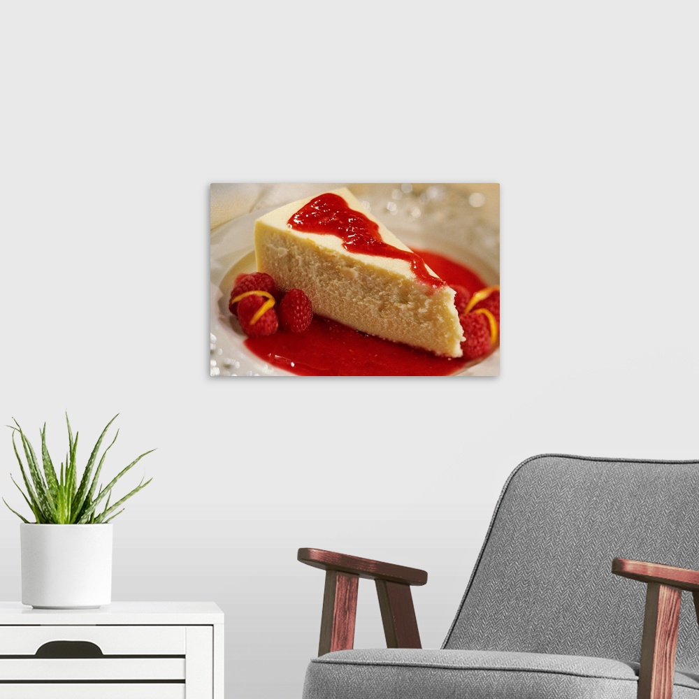 A modern room featuring Cheesecake with raspberries
