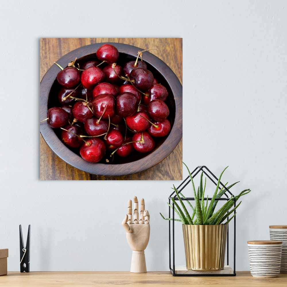 A bohemian room featuring Cherries in wooden bowl