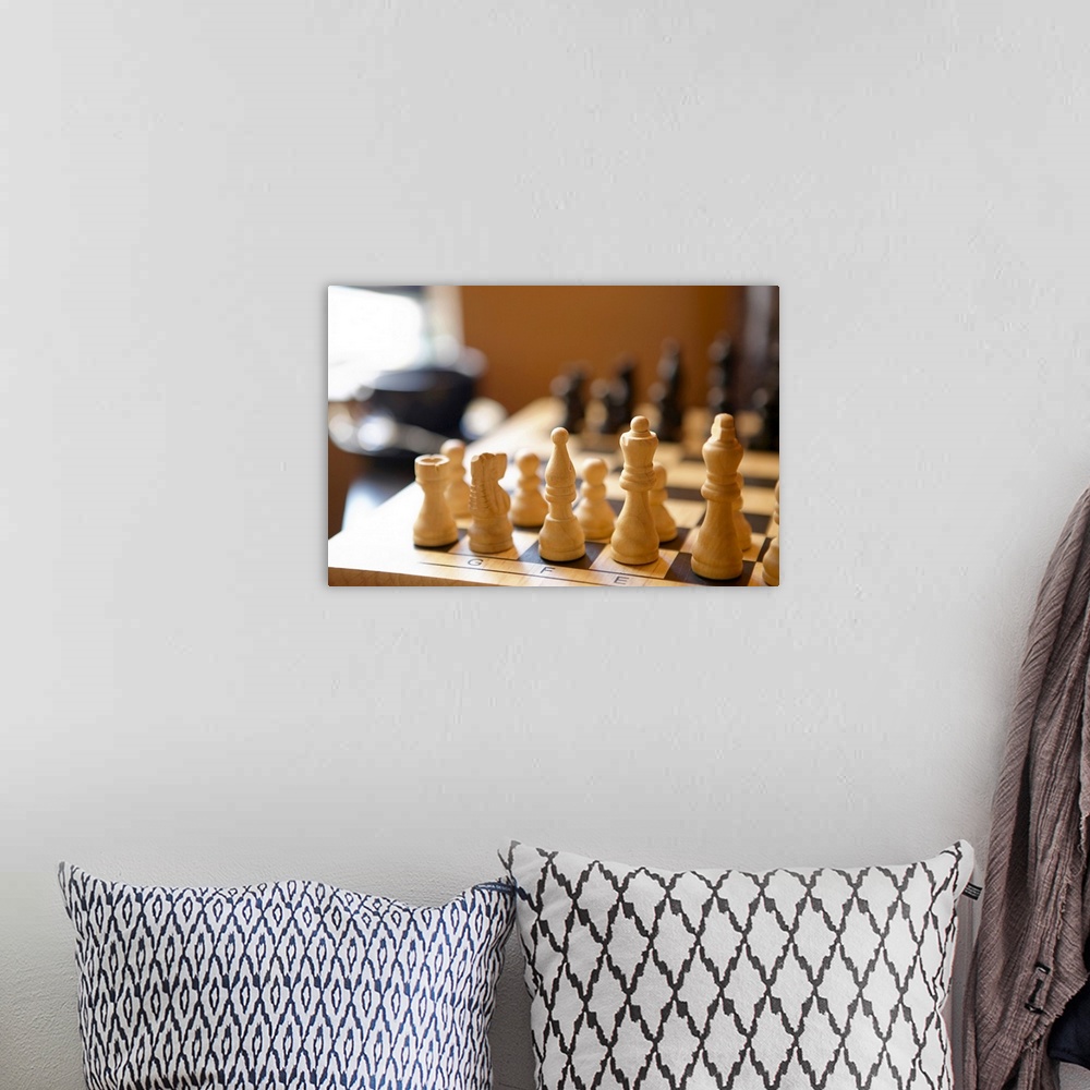 A bohemian room featuring Chessboard with chess pieces