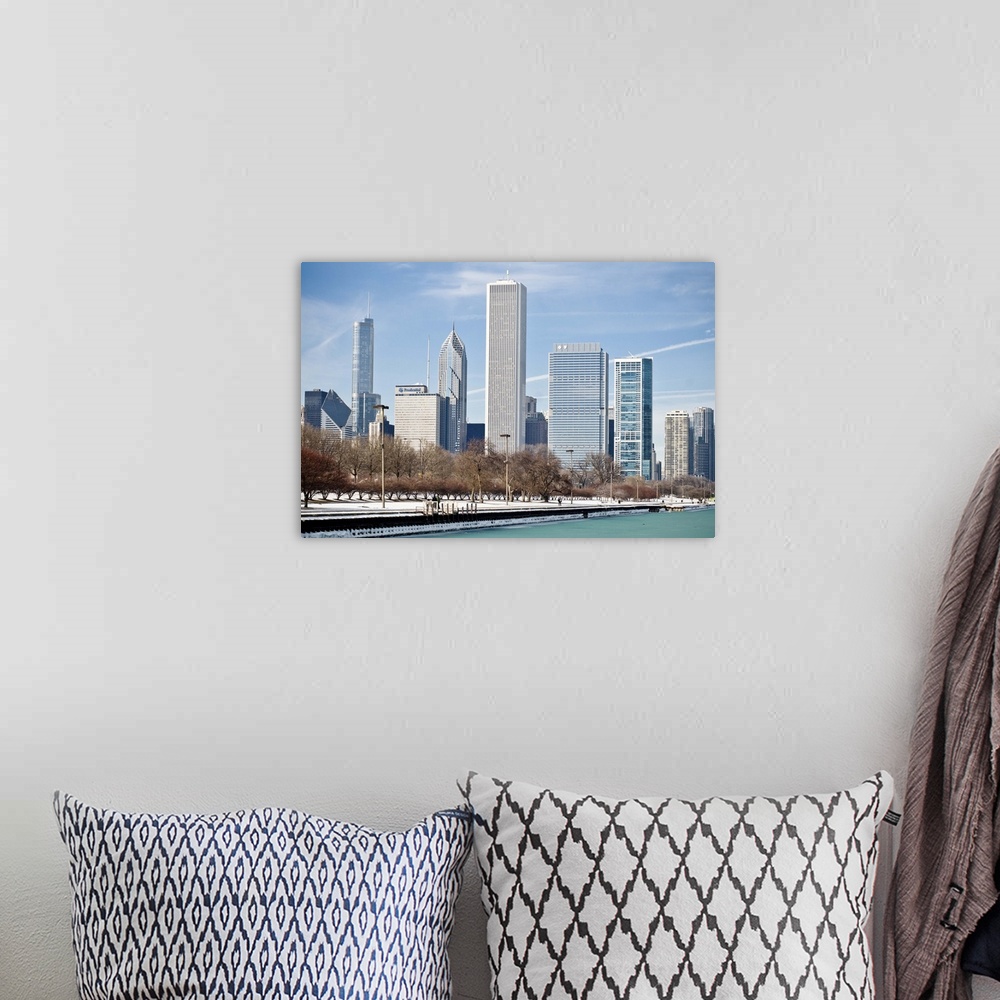 A bohemian room featuring Chicago skyline across frozen Lake Michigan.