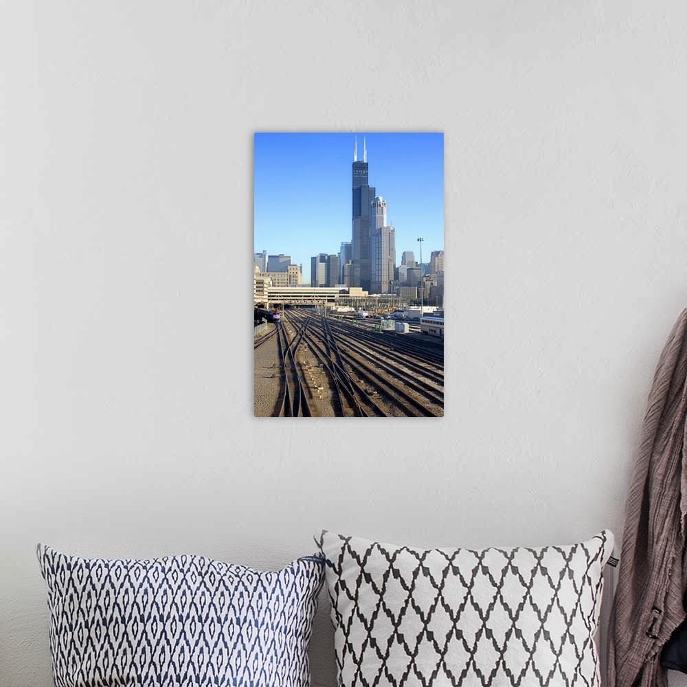 A bohemian room featuring Chicago skyline and railroad tracks