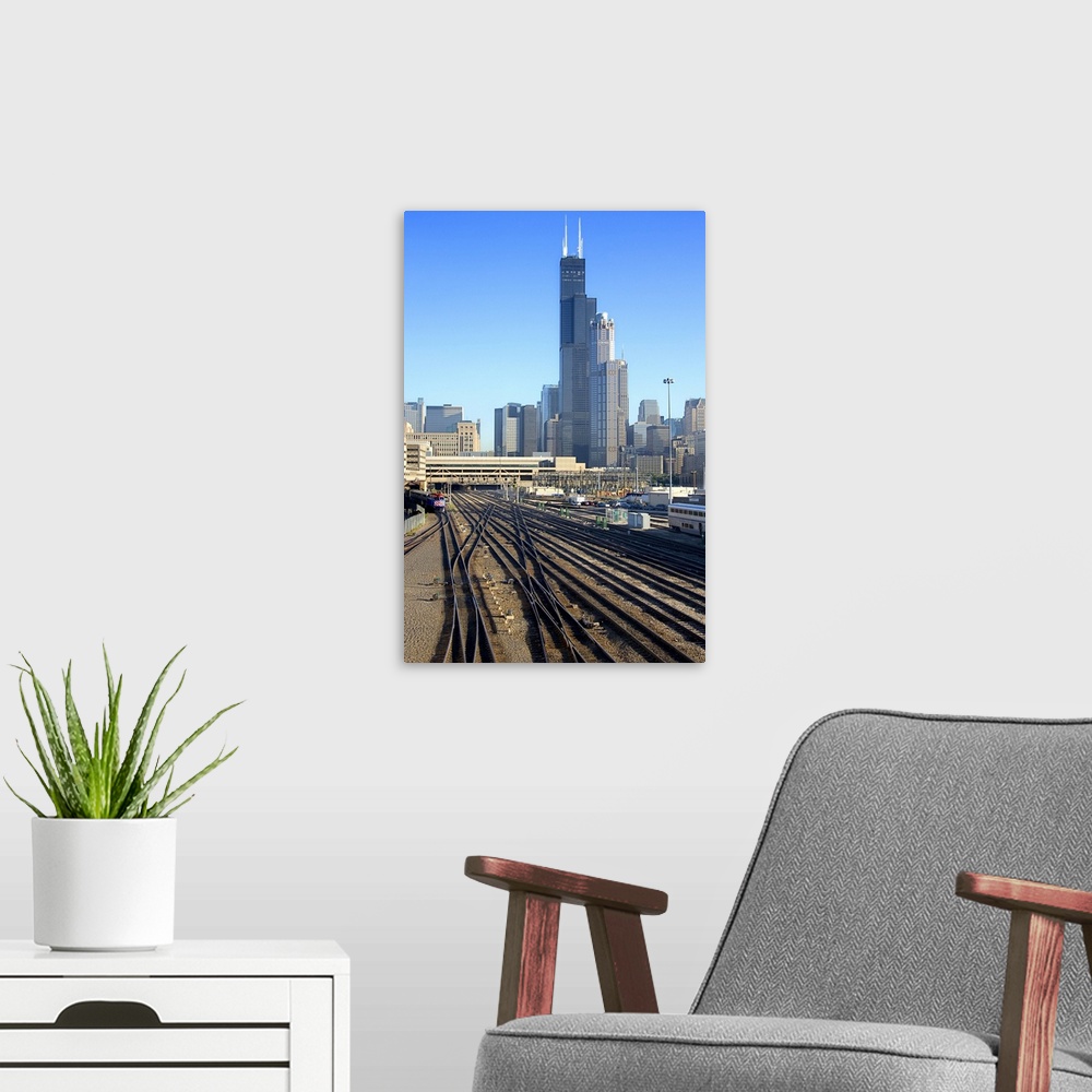 A modern room featuring Chicago skyline and railroad tracks