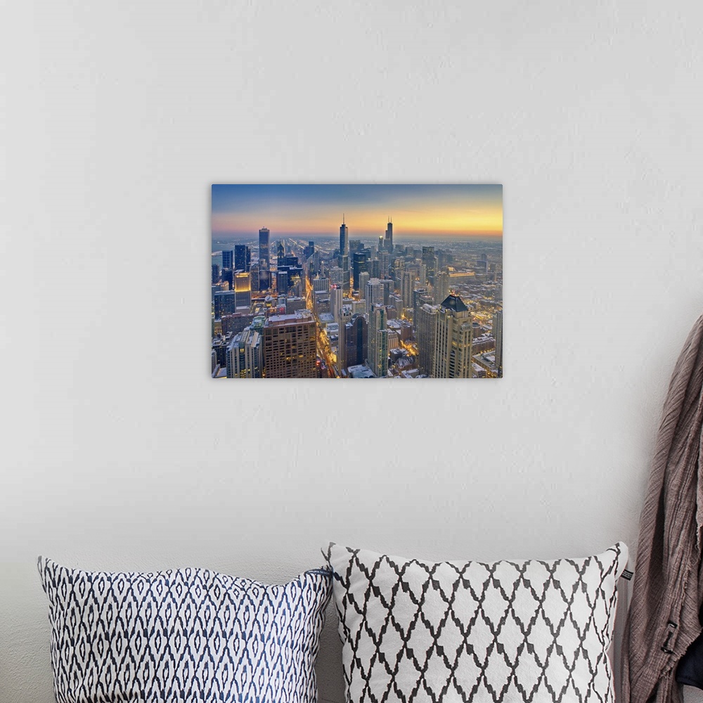 A bohemian room featuring Chicago skyline in blue hour.