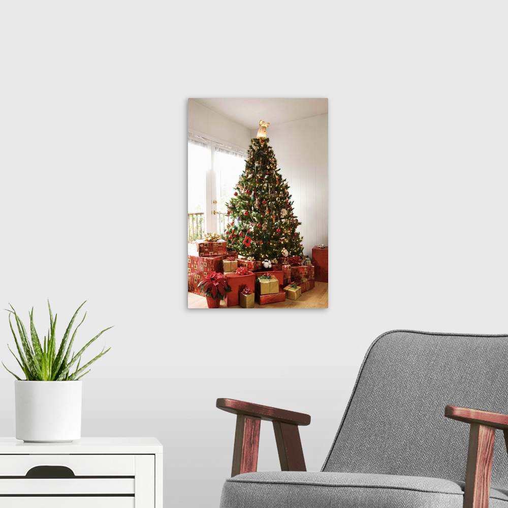 A modern room featuring Christmas tree and gifts