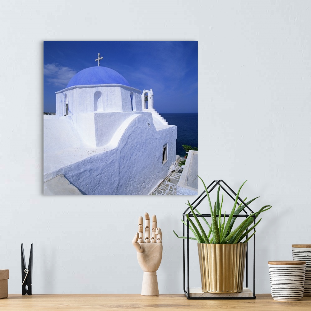 A bohemian room featuring Church with blue dome in Santorini, Greece