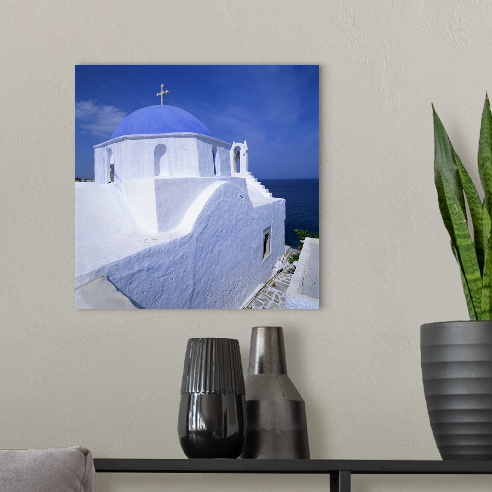 A modern room featuring Church with blue dome in Santorini, Greece