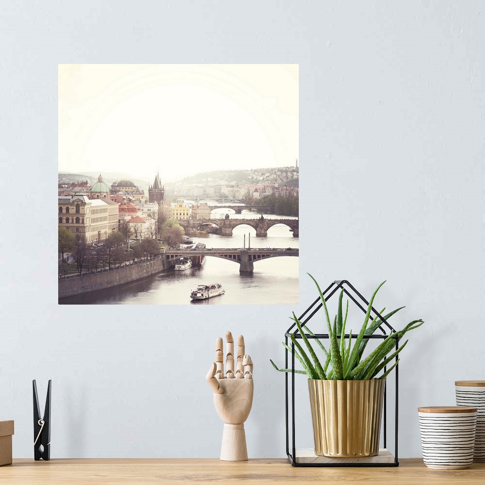 A bohemian room featuring City of Prague with bridges including Charles bridge crossing Vltava river.