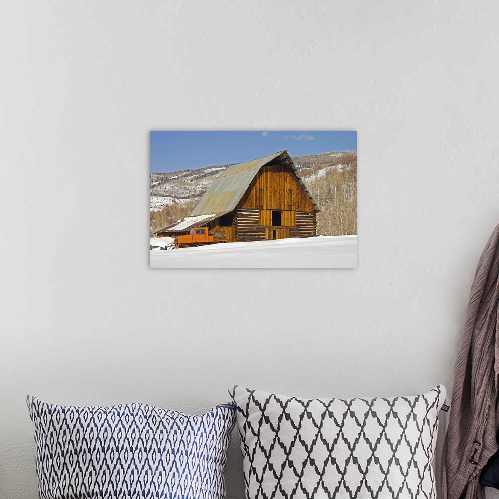 A bohemian room featuring Classic western barn in winter