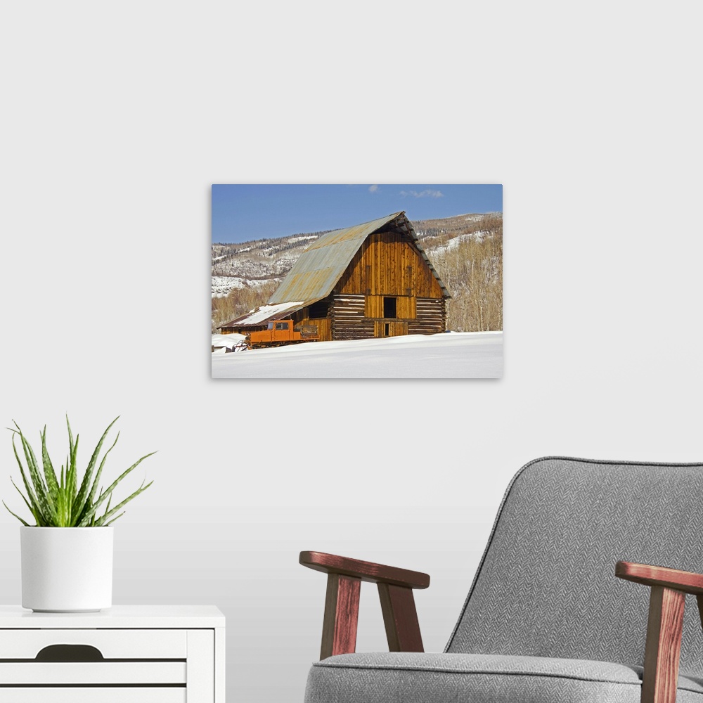 A modern room featuring Classic western barn in winter