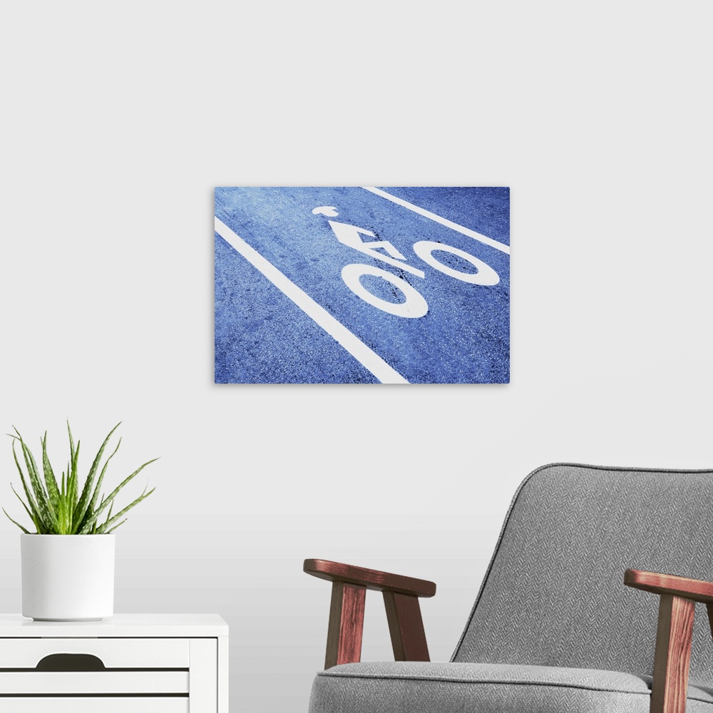 A modern room featuring Close-up of a bicycle sign on the road