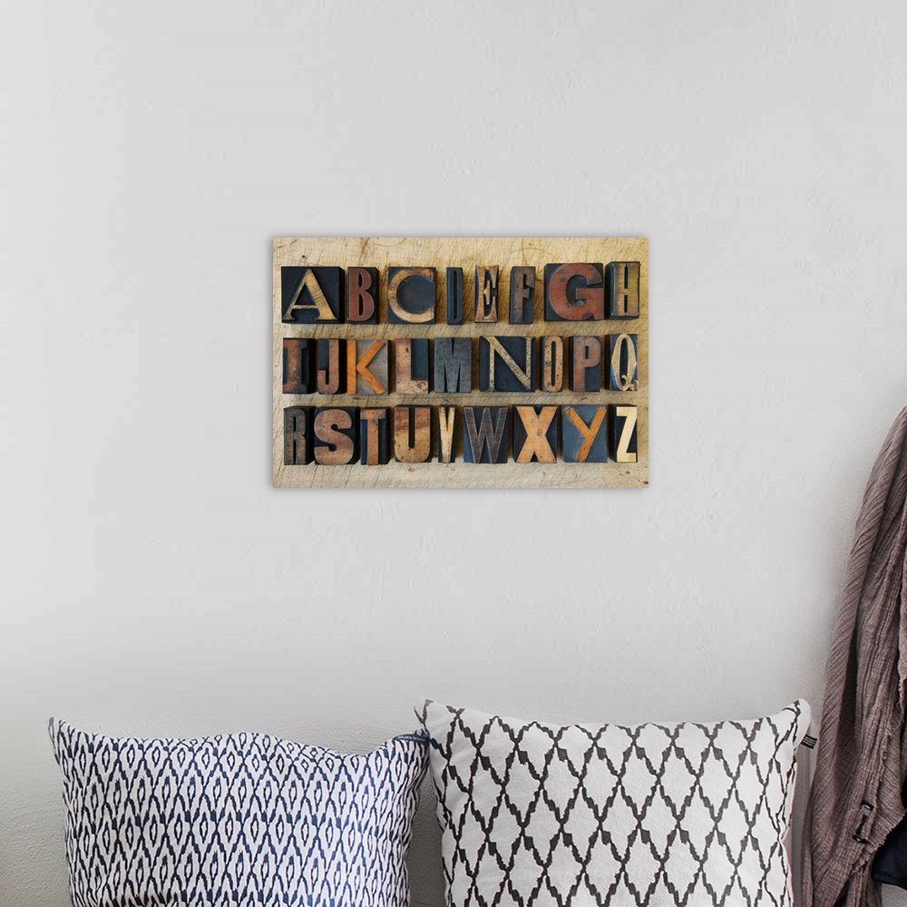 A bohemian room featuring Close up of alphabet on letterpress