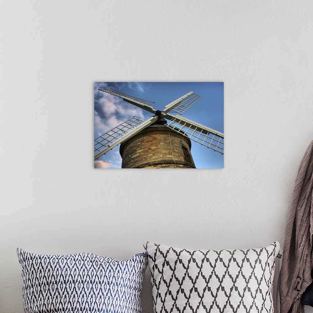 A bohemian room featuring Close up of Chesterton windmill against sky.