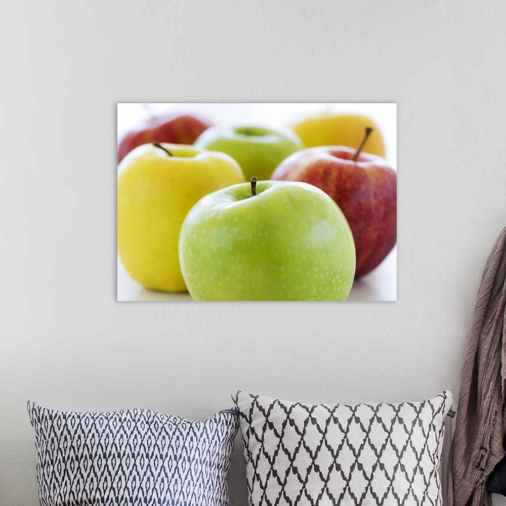 A bohemian room featuring Close up of colorful apples, studio shot
