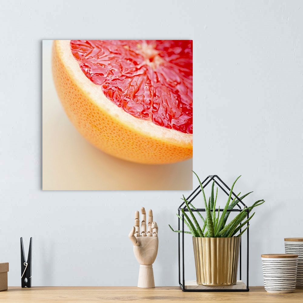 A bohemian room featuring Close up of halved pink grapefruit.