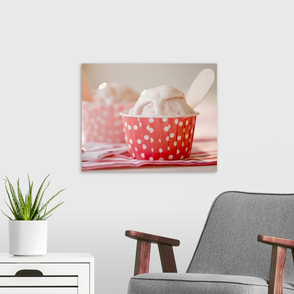 A modern room featuring Close up of ice cream in colorful cups