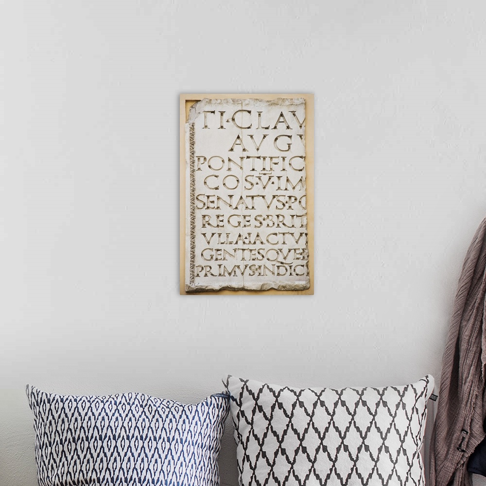 A bohemian room featuring Close up of Latin inscription