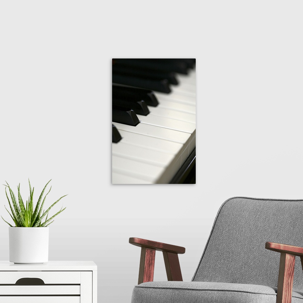 A modern room featuring Close-up of piano