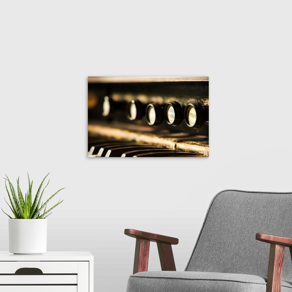 A modern room featuring Close-up of piano keys and buttons