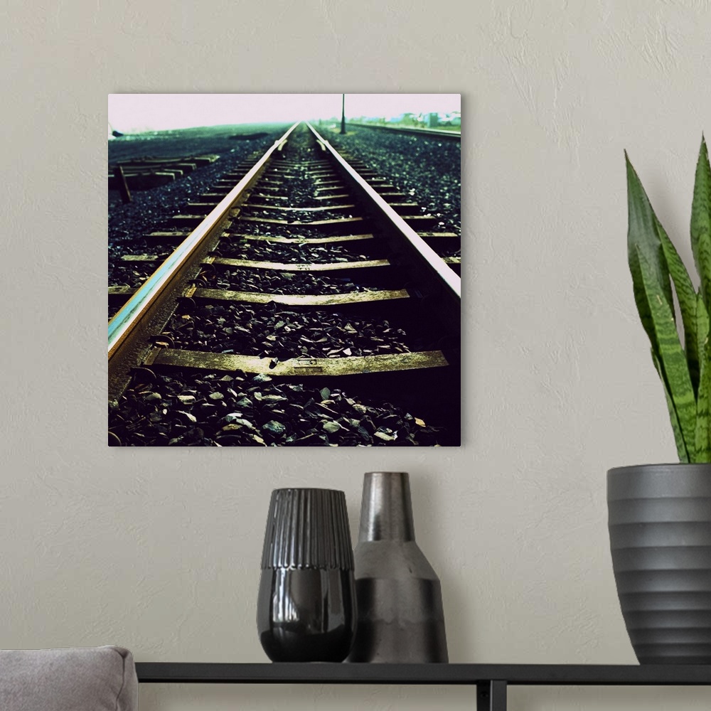 A modern room featuring Close-up of railway tracks