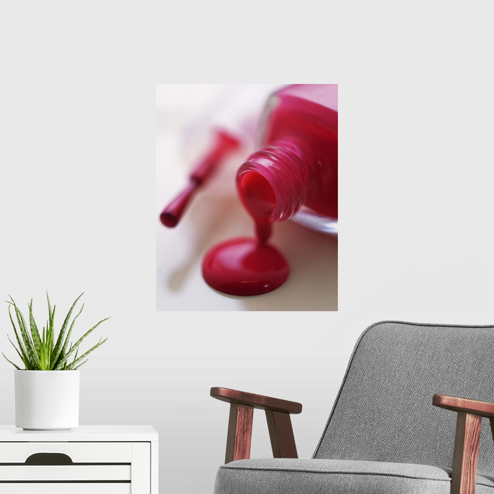 A modern room featuring Closed Up Image of Red-Colored Manicure Bottle, Differential Focus