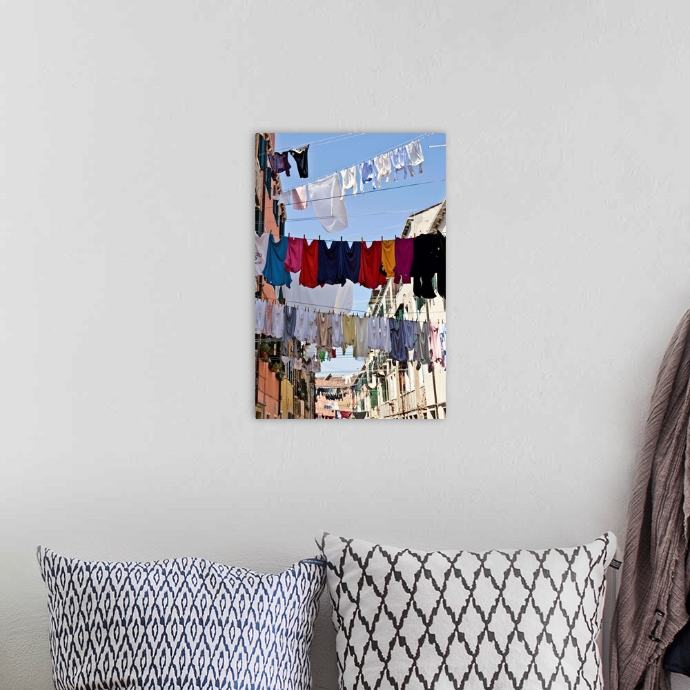 A bohemian room featuring Clotheslines hanging from apartments