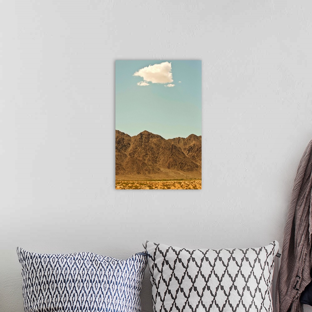 A bohemian room featuring Cloud over Nevada desert and mountains
