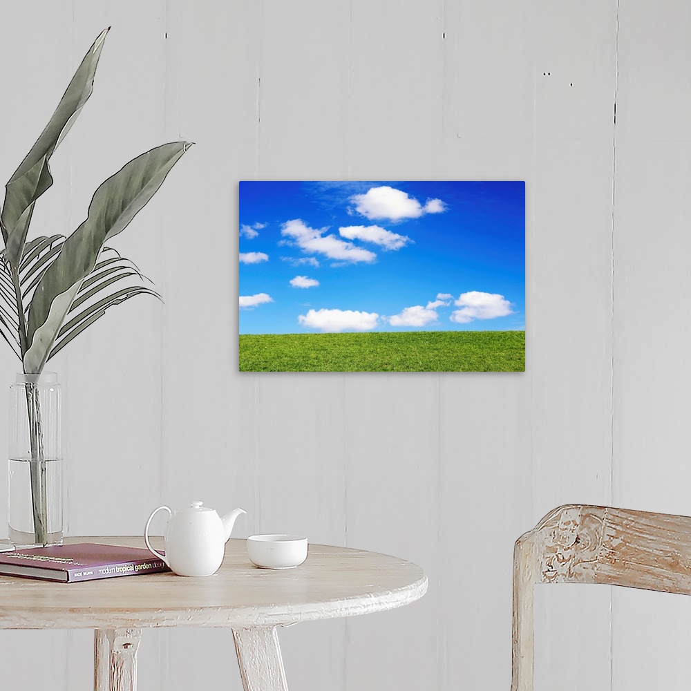 A farmhouse room featuring Clouds In Blue Sky Over Green Grass