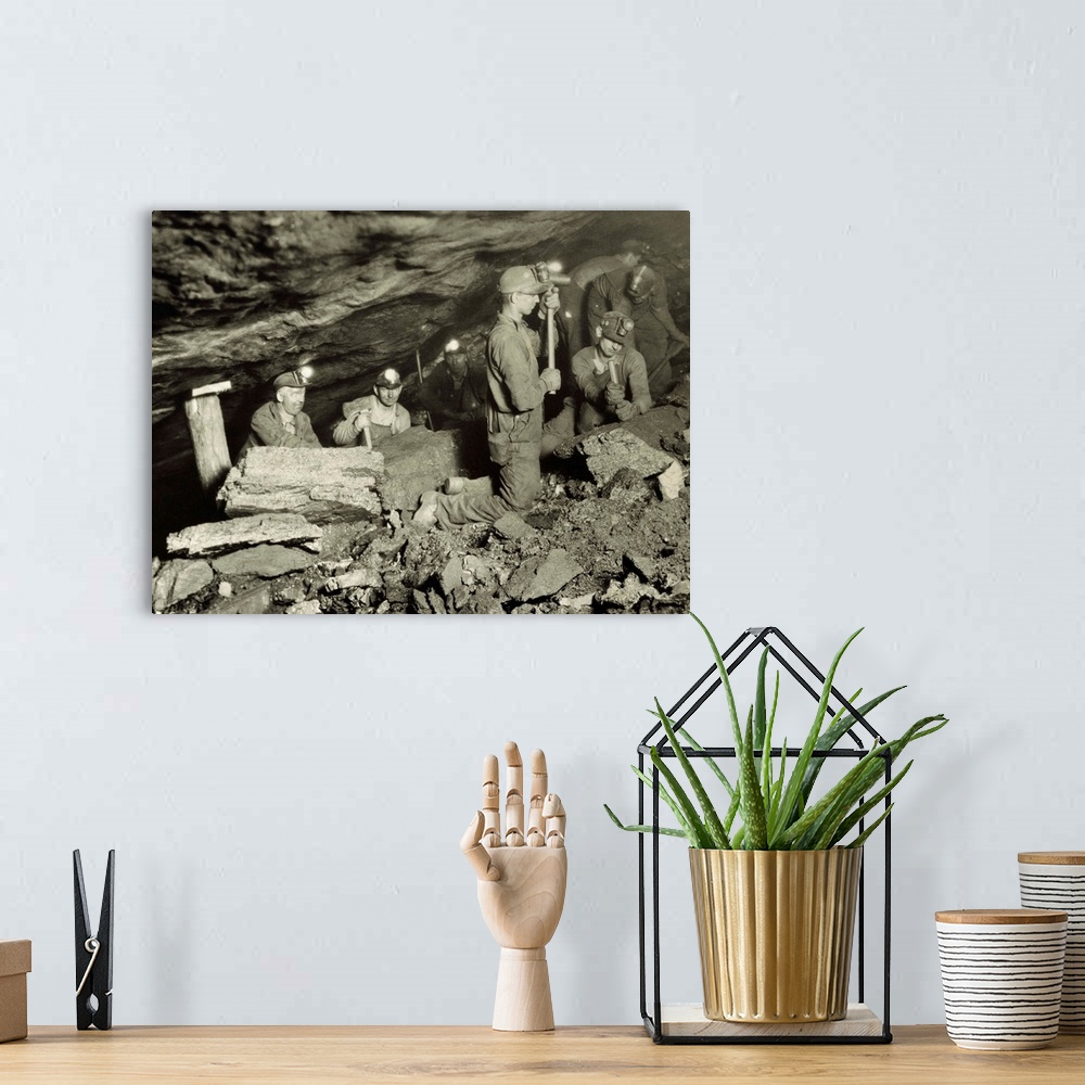 A bohemian room featuring Coal Miners Working One Thousand Feet Below Surface