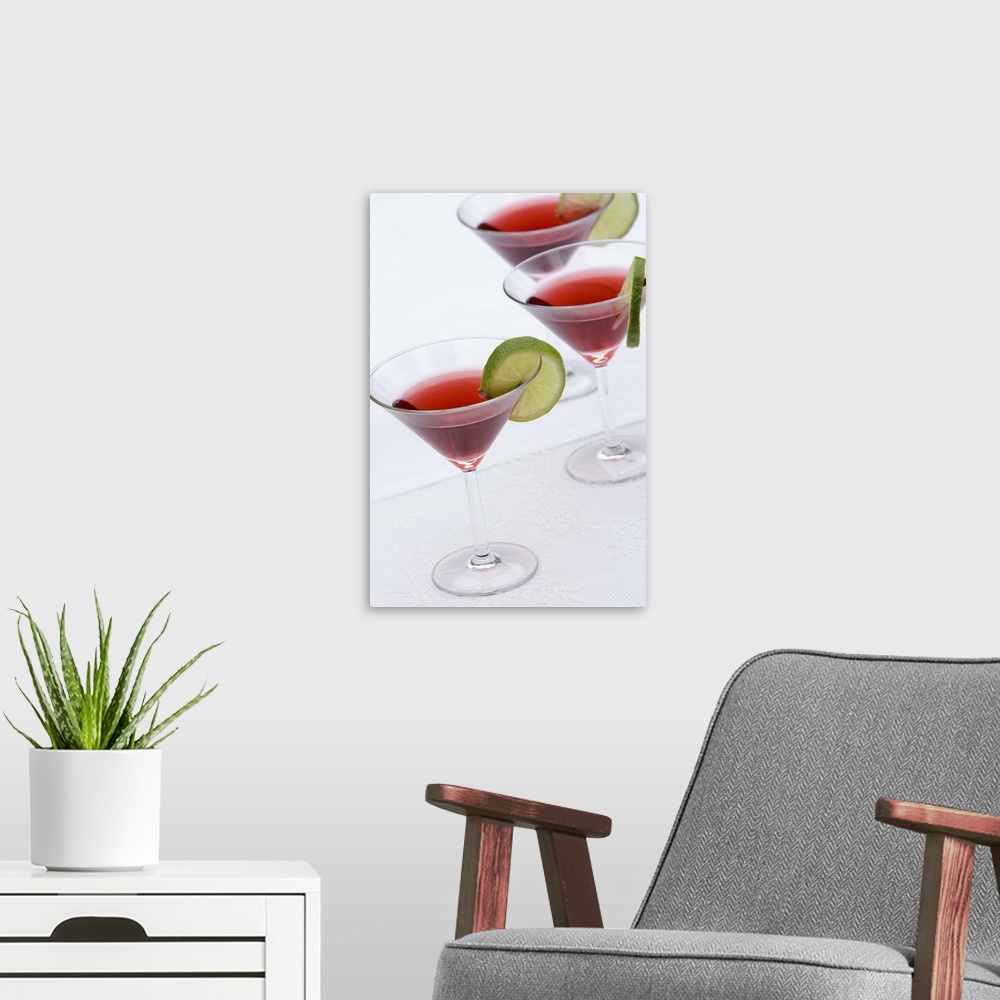 A modern room featuring Cocktails with lime slices