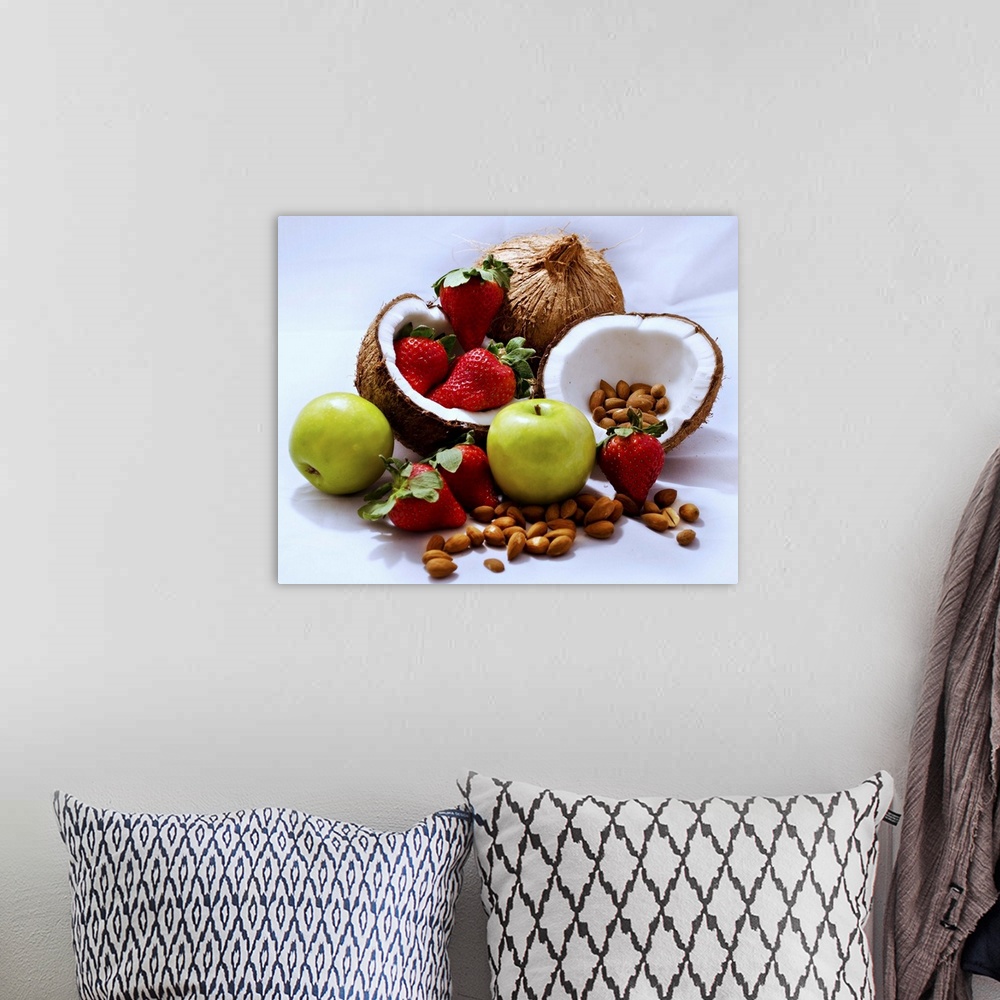 A bohemian room featuring apples, strawberries, coconut, almonds