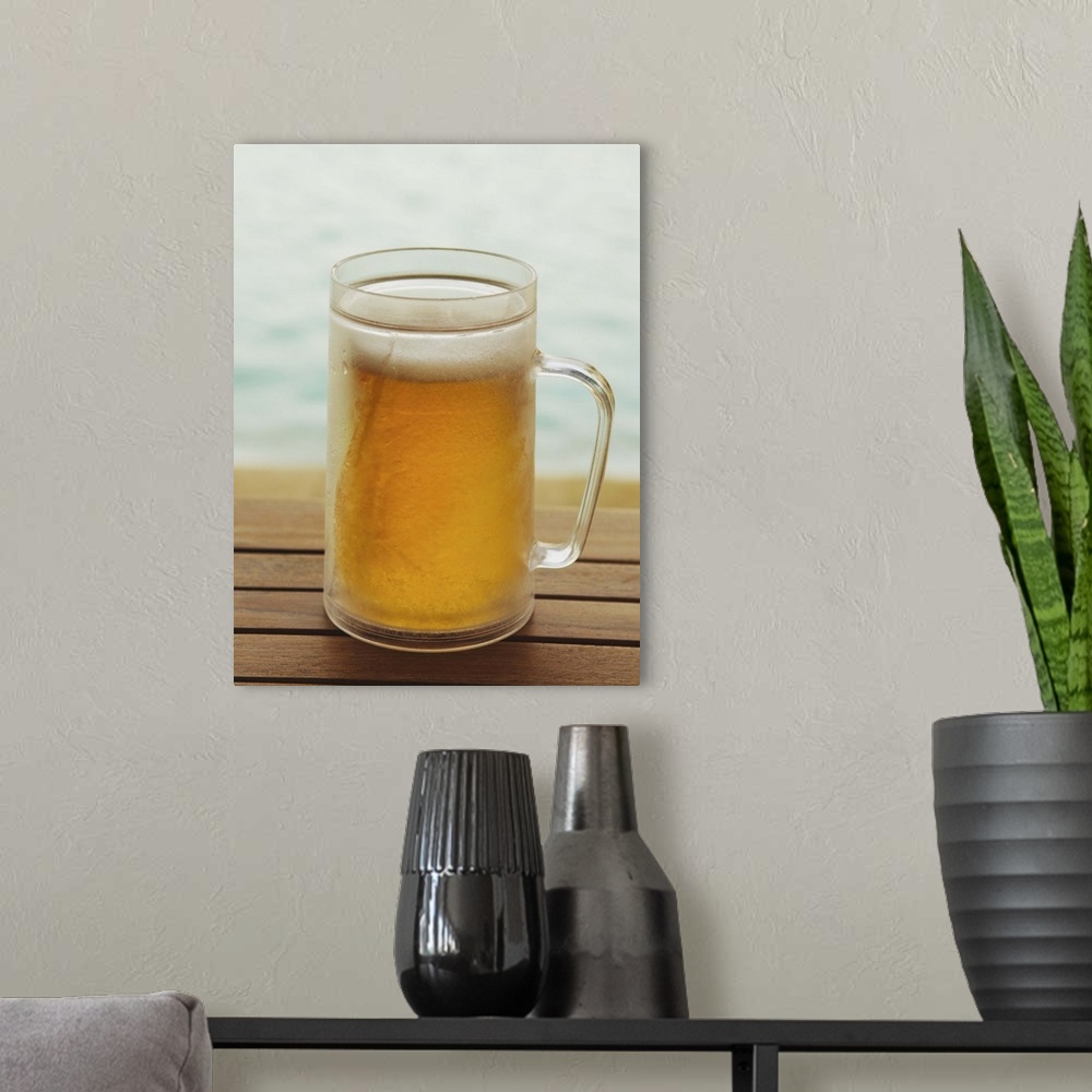A modern room featuring Cold glass of beer