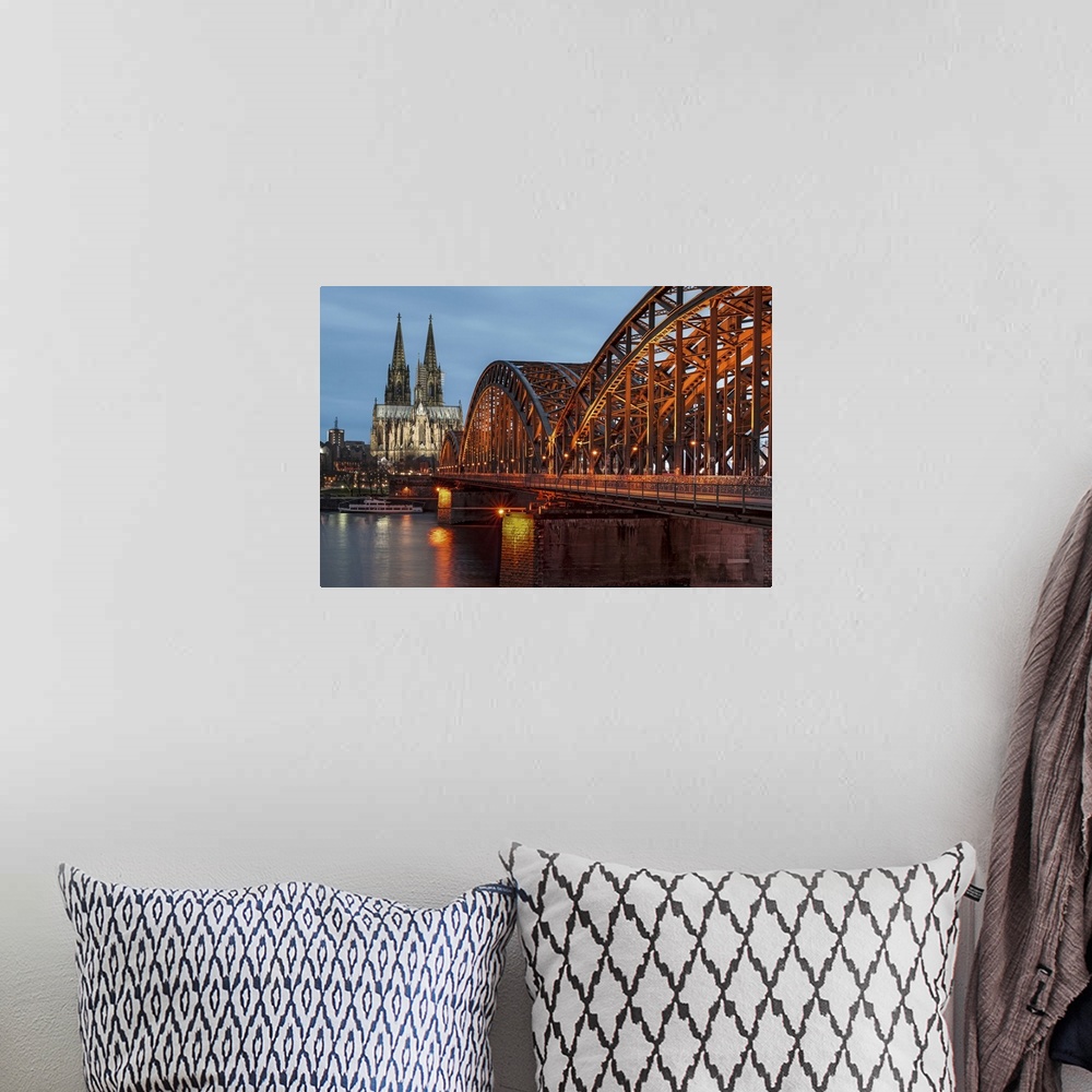 A bohemian room featuring Cologne cathedral at dusk in Germany.