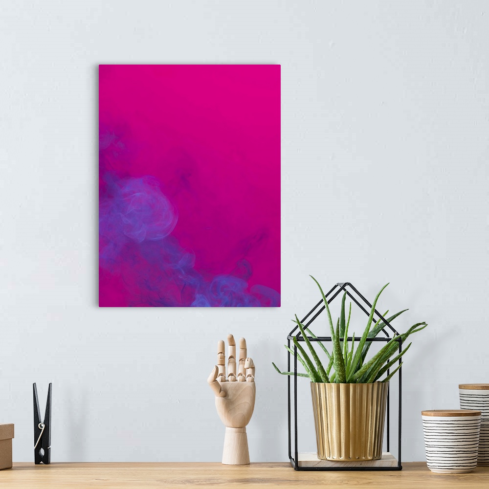 A bohemian room featuring Blue smoke that rises up and mixed into beautiful abstractions on a pink background