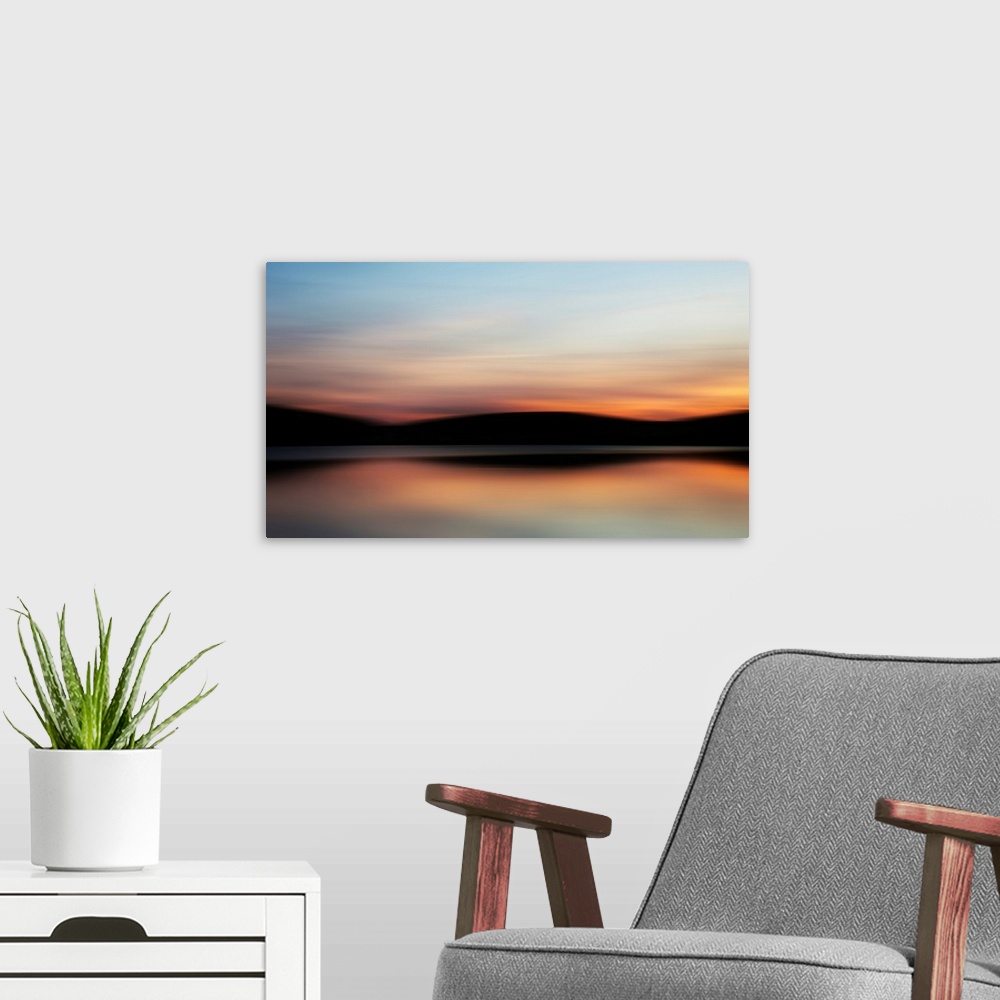 A modern room featuring Blurred intentional camera movement effect filter colorful landscape sunset. United Kingdom.