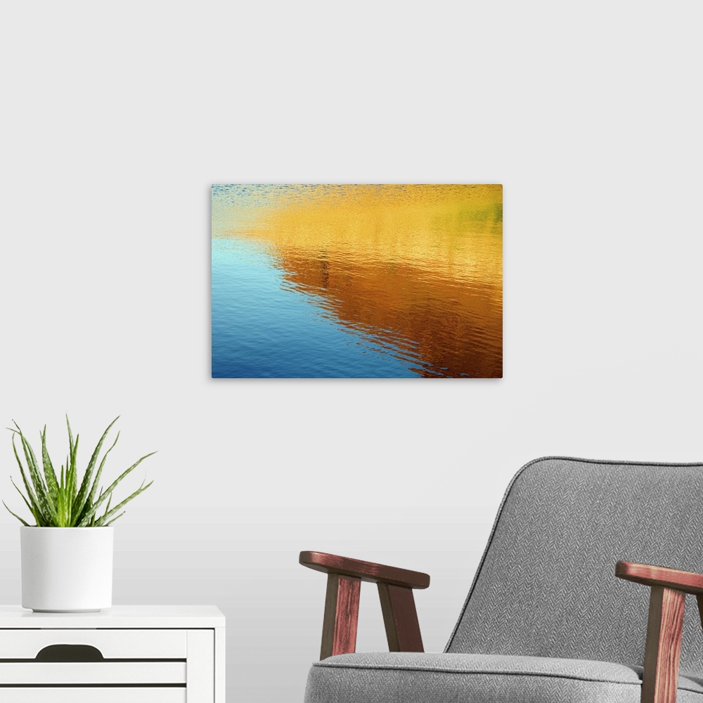 A modern room featuring Colorful photograph of ripples in water.