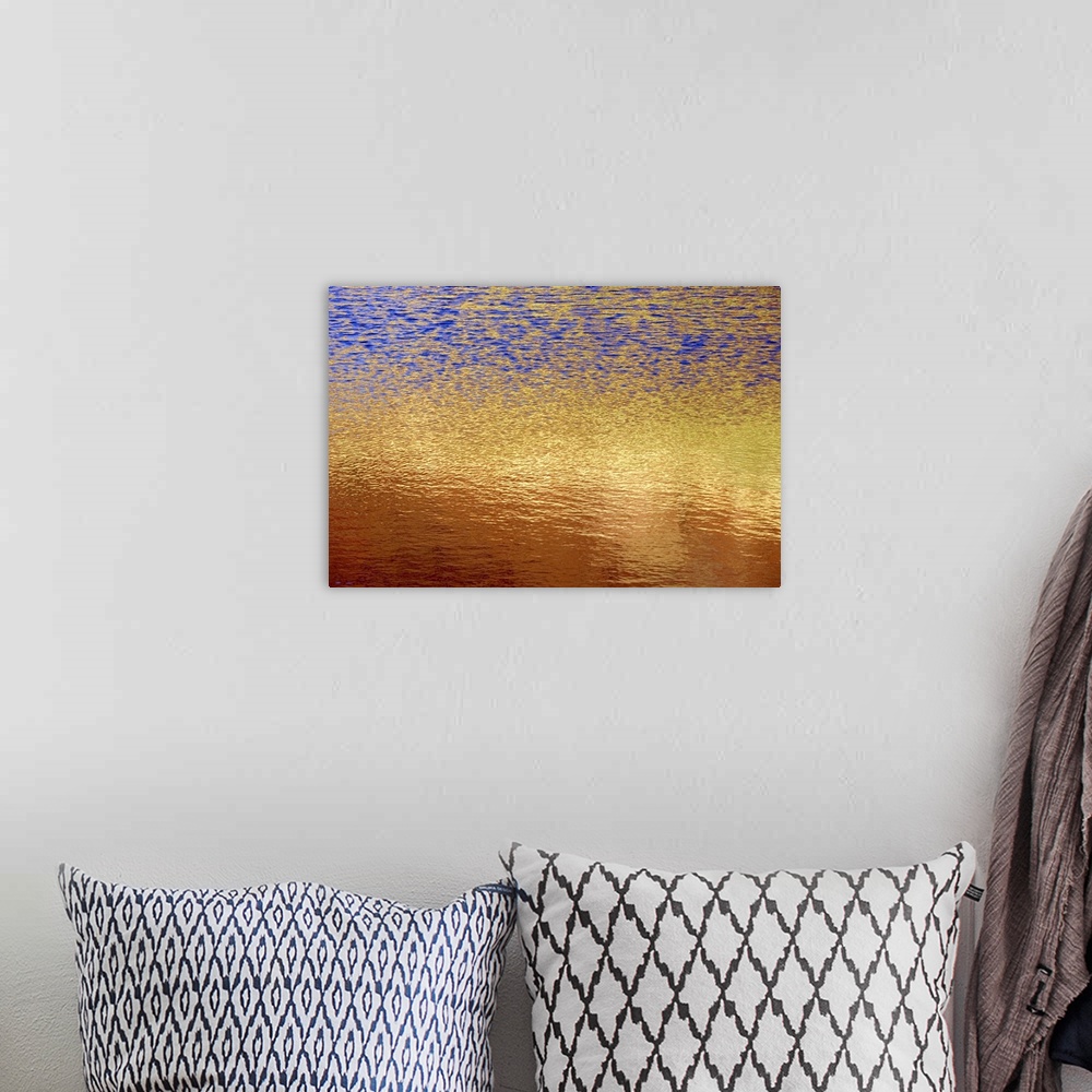 A bohemian room featuring The photograph of a setting sunos light shimmering on a lake takes on an abstract artwork look in...