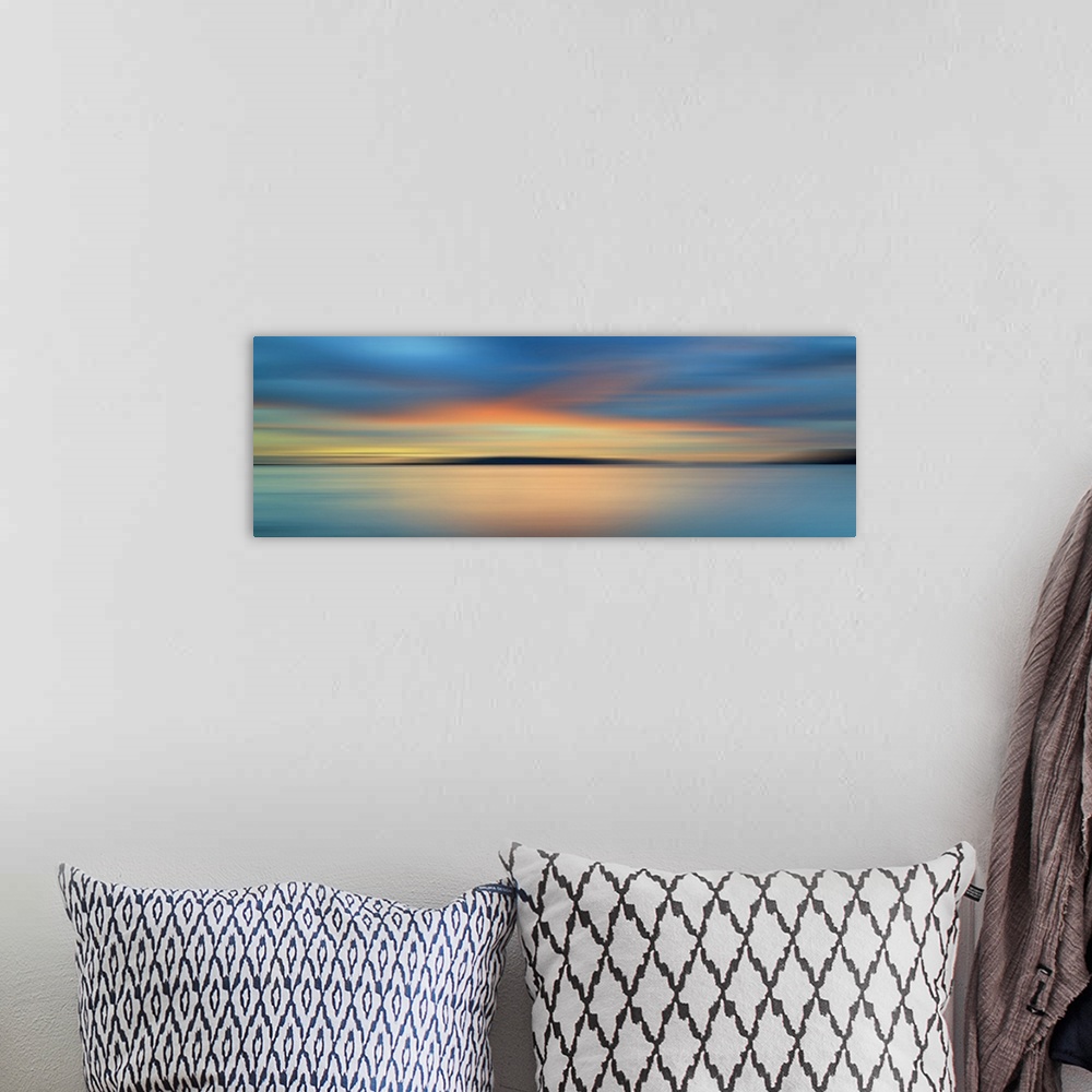 A bohemian room featuring Motion blurred colorful sunset with long exposure effect.