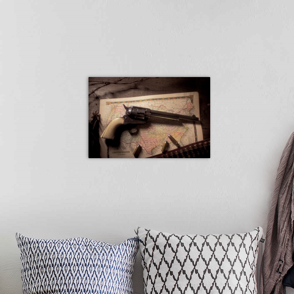 A bohemian room featuring Colt Peacemaker with ammo