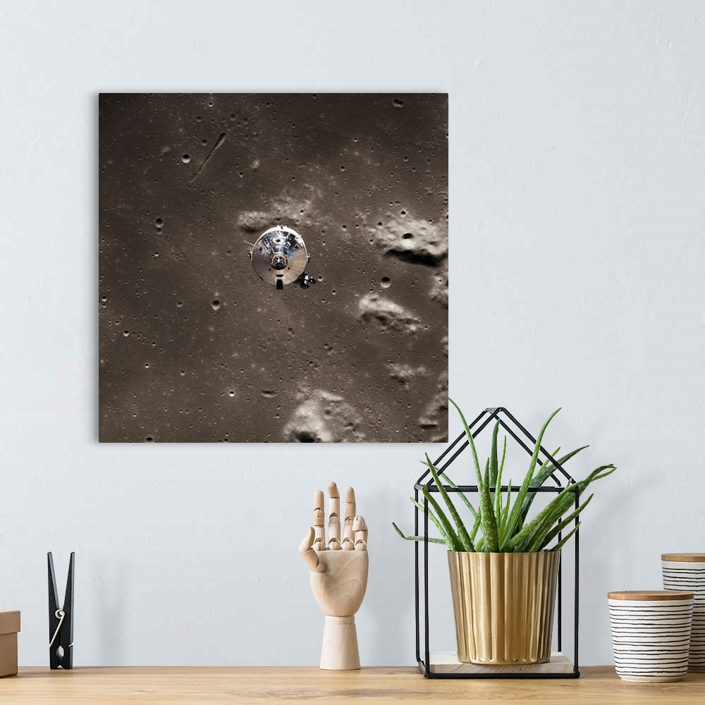 A bohemian room featuring The command module Columbia pulls away from the Apollo 11 astronauts aboard the lunar module, jus...