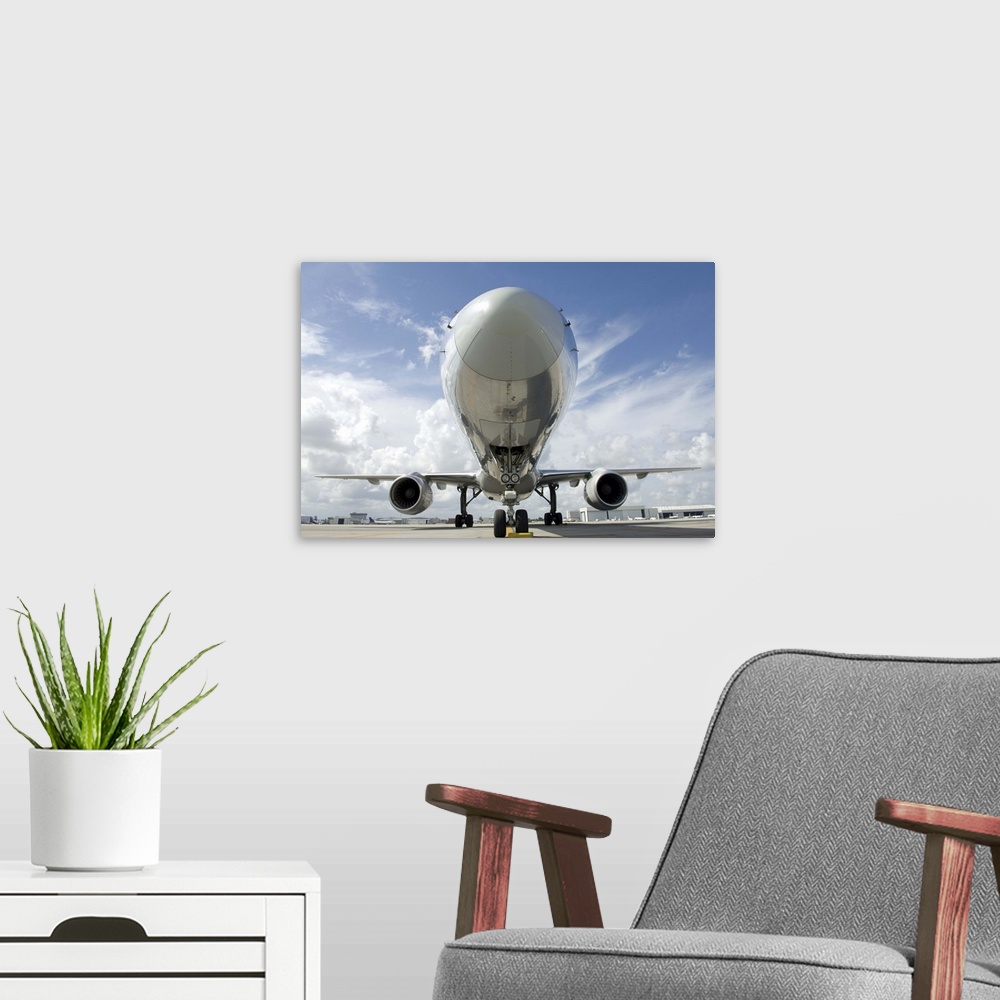 A modern room featuring Front End Section of Commercial Jet on Tarmac