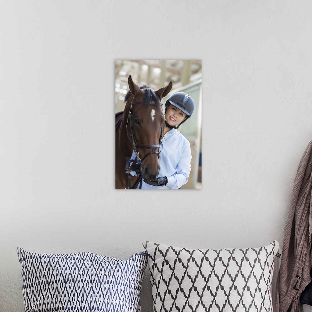 A bohemian room featuring Confident equestrian and her horse in stable