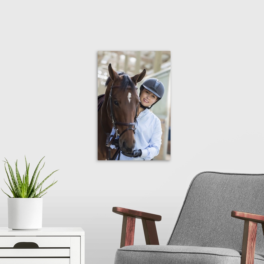 A modern room featuring Confident equestrian and her horse in stable