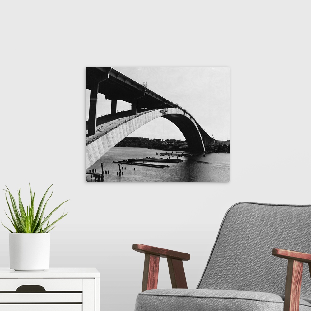 A modern room featuring The construction of the Gladesville Bridge in Sydney, which when completed will be the world's la...