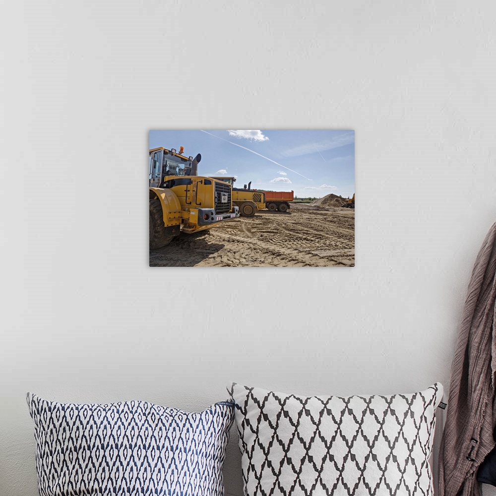 A bohemian room featuring Construction vehicles on work site