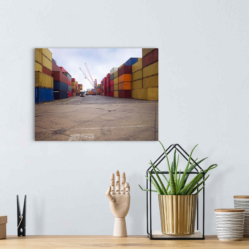 A bohemian room featuring Containers stacked in a shipping yard
