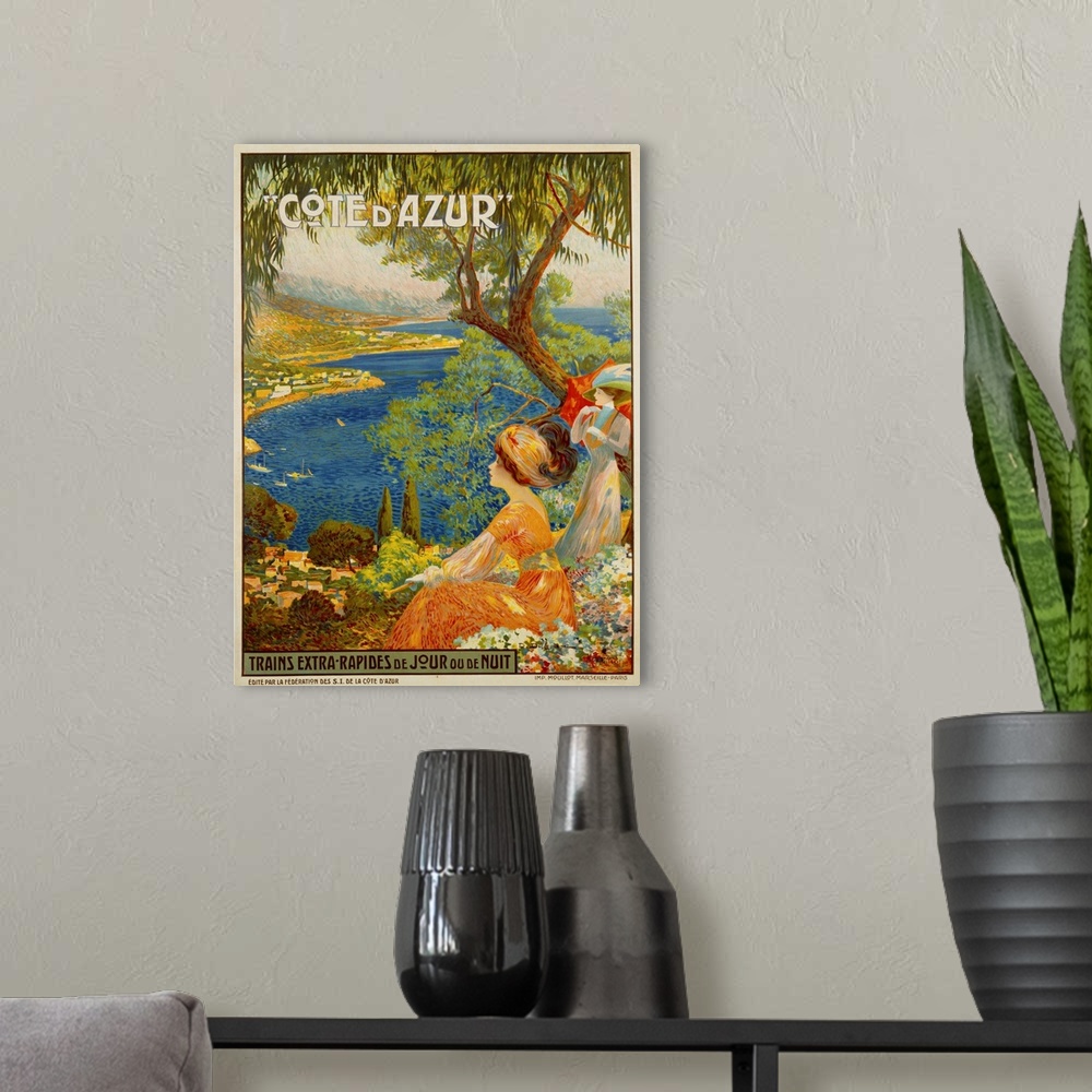 A modern room featuring Cote D'Azur Travel Poster By David Dellepiane