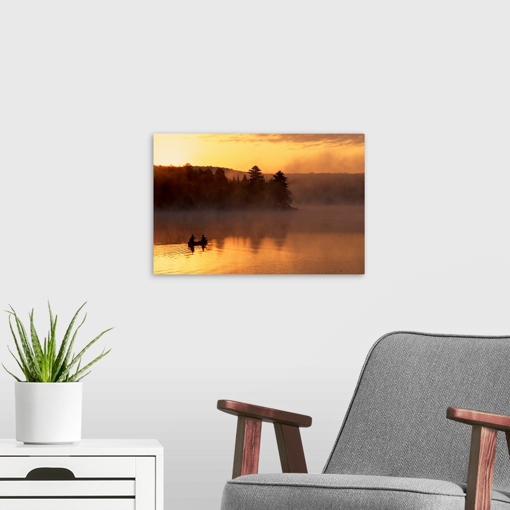 A modern room featuring Couple canoeing in early morning
