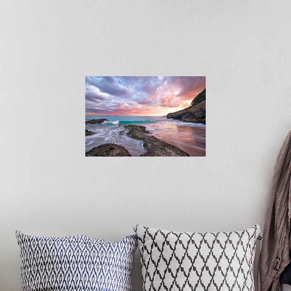 A bohemian room featuring Photograph of sandy inlet with water rushing in from the ocean under a cloudy sky at sunset.